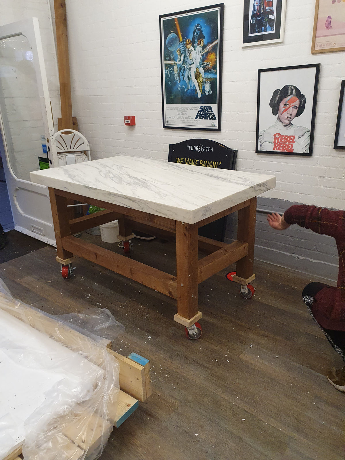 Thick marble slab on a worktable at The Fudge Patch candy shop.